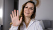 © 4kclips - Young woman attends a conference call - home shooting