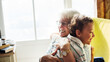 © Rawpixel.com - Grandma and grandson hugging after social distancing