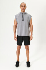 Man in a gray sleeveless hoodie activewear