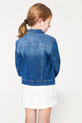 Canvas Print - Girl's blue denim jacket in studio