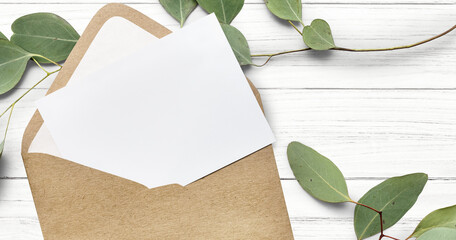 Wall Mural - white card mockup in a brown envelope website banner template