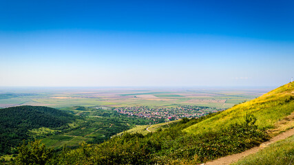 Romanian village with a large plain in the summer