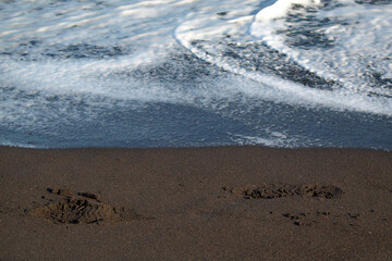 Kamchatka. Khalaktyrsky beach. Black volcanic sand beach on the Pacific Ocean. Archive photo, 2008