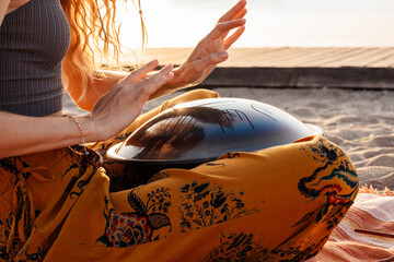 Sticker - Woman playing music on drum at the beach