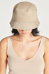 Poster - Woman wearing a beige bucket hat mockup