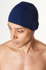 Poster - Man wearing a navy blue swimming cap mockup