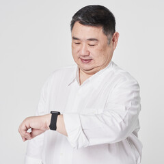 Sticker - Plus size men's white shirt with hand watch fashion shoot in studio