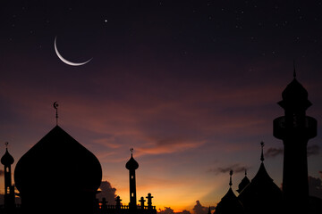 silhouette dome mosque at night and crescent moon