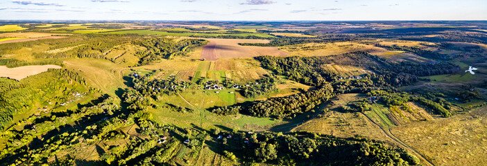 Canvas Print - Typical aerial landscape of the Central Black Earth Region of Russia. Bolshoe Gorodkovo village, Kursk region