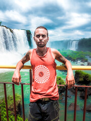 Wall Mural - person in the iguazu falls 