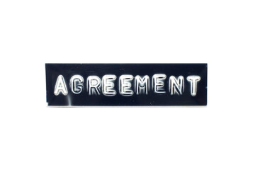 Wall Mural - Embossed letter in word agreement on black banner with white background