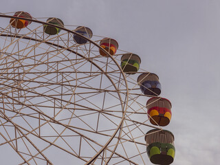 Wall Mural - Looking upward to the Ferris wheel with clear sky.