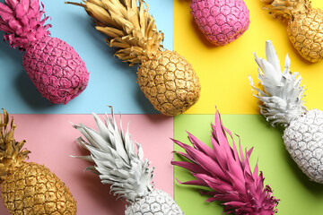 Poster - Many white, pink and golden pineapples on color background, flat lay. Creative concept