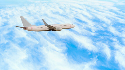 White passenger airplane over the clouds  - Travel by air transport