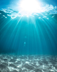 Background of sun beams through clear water