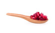 Fruit pomegranate in wood spoon on white background