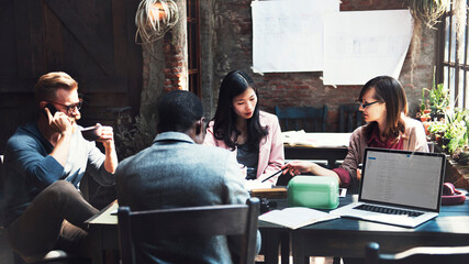 Wall Mural - diverse business colleagues meeting in a cafe