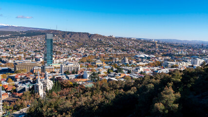 Wall Mural - Panorama view of Tbilisi. Modern landmark - high-rise hotel