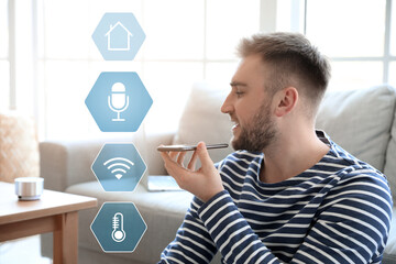 Sticker - Man with mobile phone in room. Modern technology and smart home automation