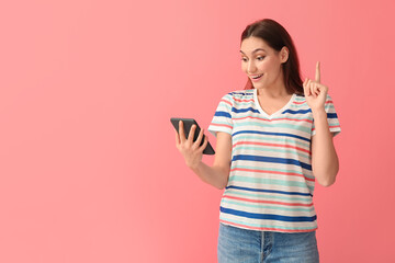 Poster - Young woman with e-reader on color background