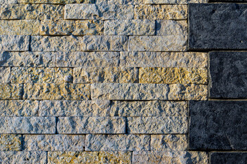 stone wall, a combination of two different types of stone in one wall