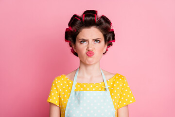 Poster - Close-up portrait of her she nice brown-haired housewife wearing curlers bad mood grimacing dislike pout lips isolated on pink pastel color background