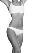 © Nobilior - Slim woman body on white background, isolated