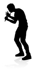 Wall Mural - A singer pop, country music, rock star or hiphop rapper artist vocalist singing in silhouette