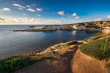 Limestone rock with arch, S'`Archittu di Santa Caterina in Oristano Province, Sardinia, Italy