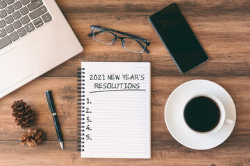 Wall Mural - 2021 New Year's Resolutions text on Note Pad
