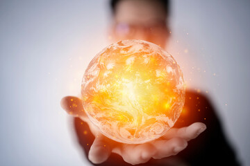 Wall Mural - businessman holding in hands with global connection concept. energy saving concept, elements of this