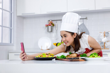 Wall Mural - Chef selfie with food she make.