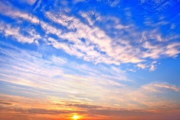Wall Mural - cold sunset sky on winter evening landscape background. wide panorama cloudscape. scenic sky with se
