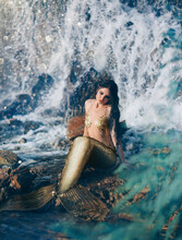Fantasy Woman Real Mermaid Myth Goddess Of Sea. Art Goldfish Creative Costume Ocean Siren Sexy Body Spa Relaxation. Mystic Spirit Of Lake River Floats Swimming In Water. Sunset Nature Magic Sun Light 