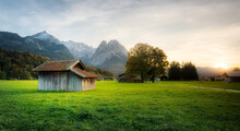 Autumn Mood. Sunset In Bavarian Alps With A Hut In Front Of The Picture.