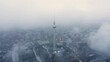 Television Tower at Alexanderplatz in Berlin in fog.
