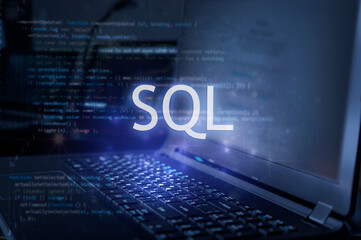 sql inscription against laptop and code background. learn sql programming language, computer courses