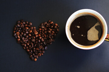 coffee beans heart and cup of coffee