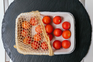 Sticker - Tray with fresh cherry tomatoes. Organic food. Fresh vegetables.