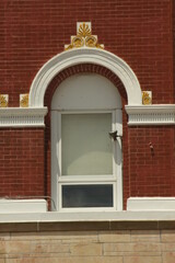 Canvas Print - Window of a brick building