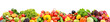 Wide panorama multi-colored fresh fruits and vegetables isolated on white