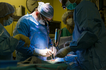 Wall Mural - Surgeons in the operating room do operation