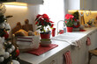 © New Africa - Kitchen counter with dishware and Christmas decor