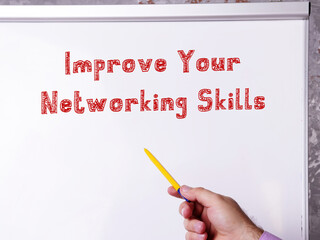 Motivational concept meaning Improve Your Networking Skills with phrase on the sheet.