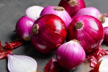 Fresh raw onion on grunge background