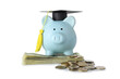 Piggy bank with graduation hat and money on white background. Tuition fees concept