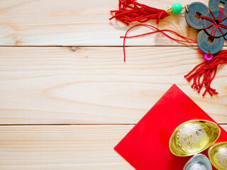 Chinese gold ingots, red packet and ornament for Chinese New Year