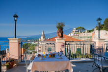 Taormina Sicily Italy Breakfast Table With A Rooftop View Over Taormina Breakfast With Coffee Bread And Fruit