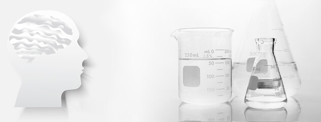 Wall Mural - beaker and flask in science laboratory and graphic of human brain in innovation intelligence concept