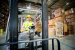 © leszekglasner - Forklift operator during work in large warehouse